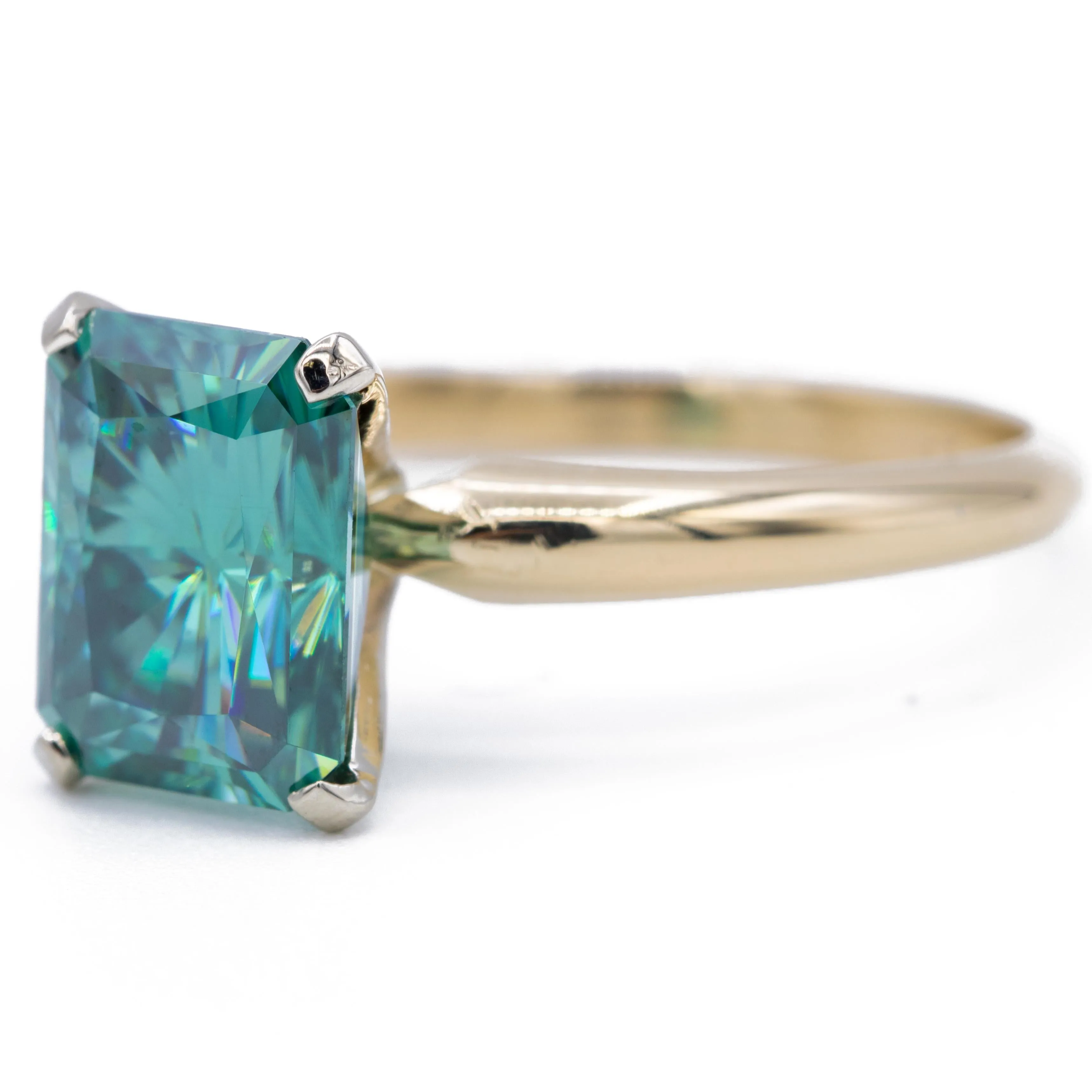 9x7mm Medium Light Emerald Green Radiant Moissanite 14KY and 14KW Two-Tone Solitaire Ring