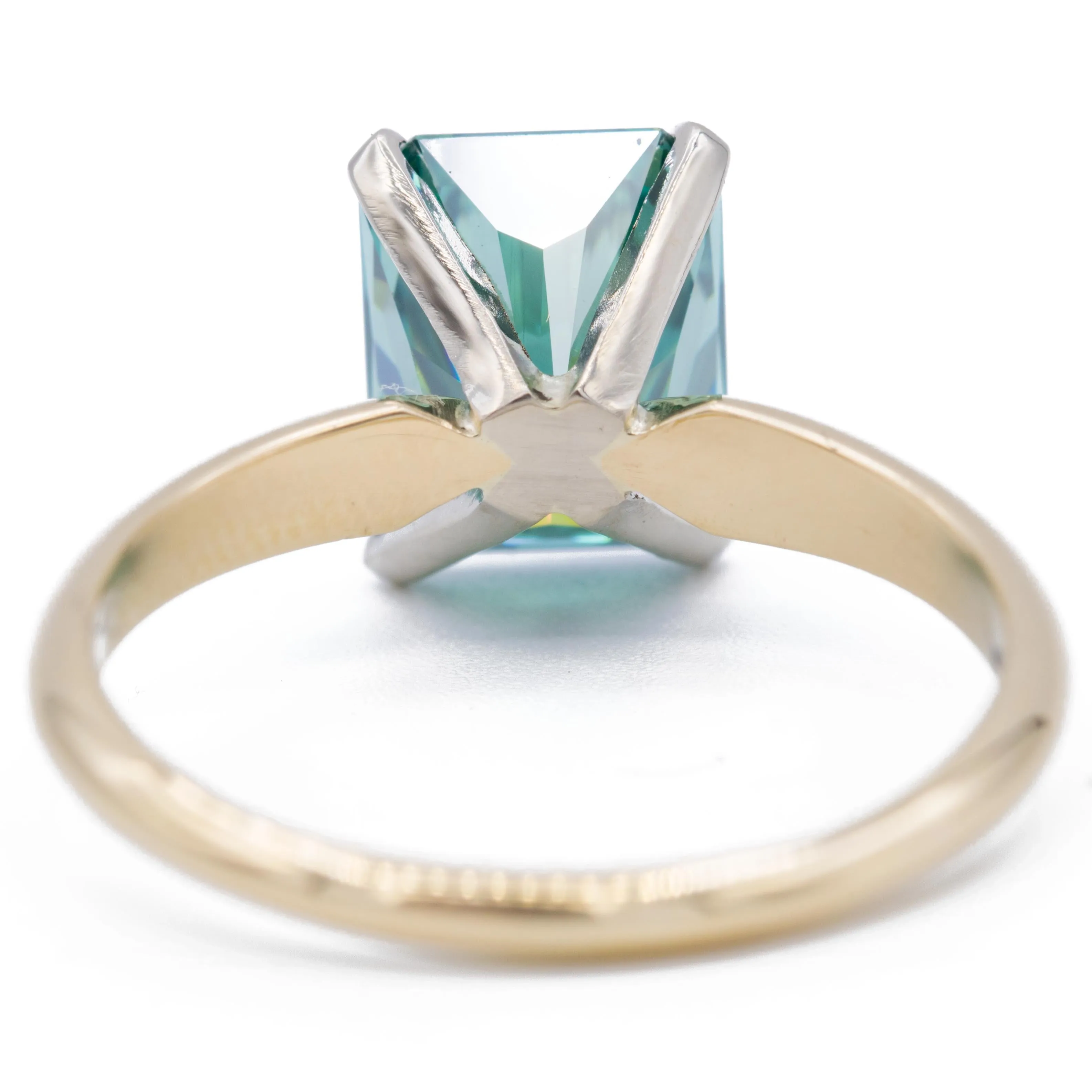 9x7mm Medium Light Emerald Green Radiant Moissanite 14KY and 14KW Two-Tone Solitaire Ring