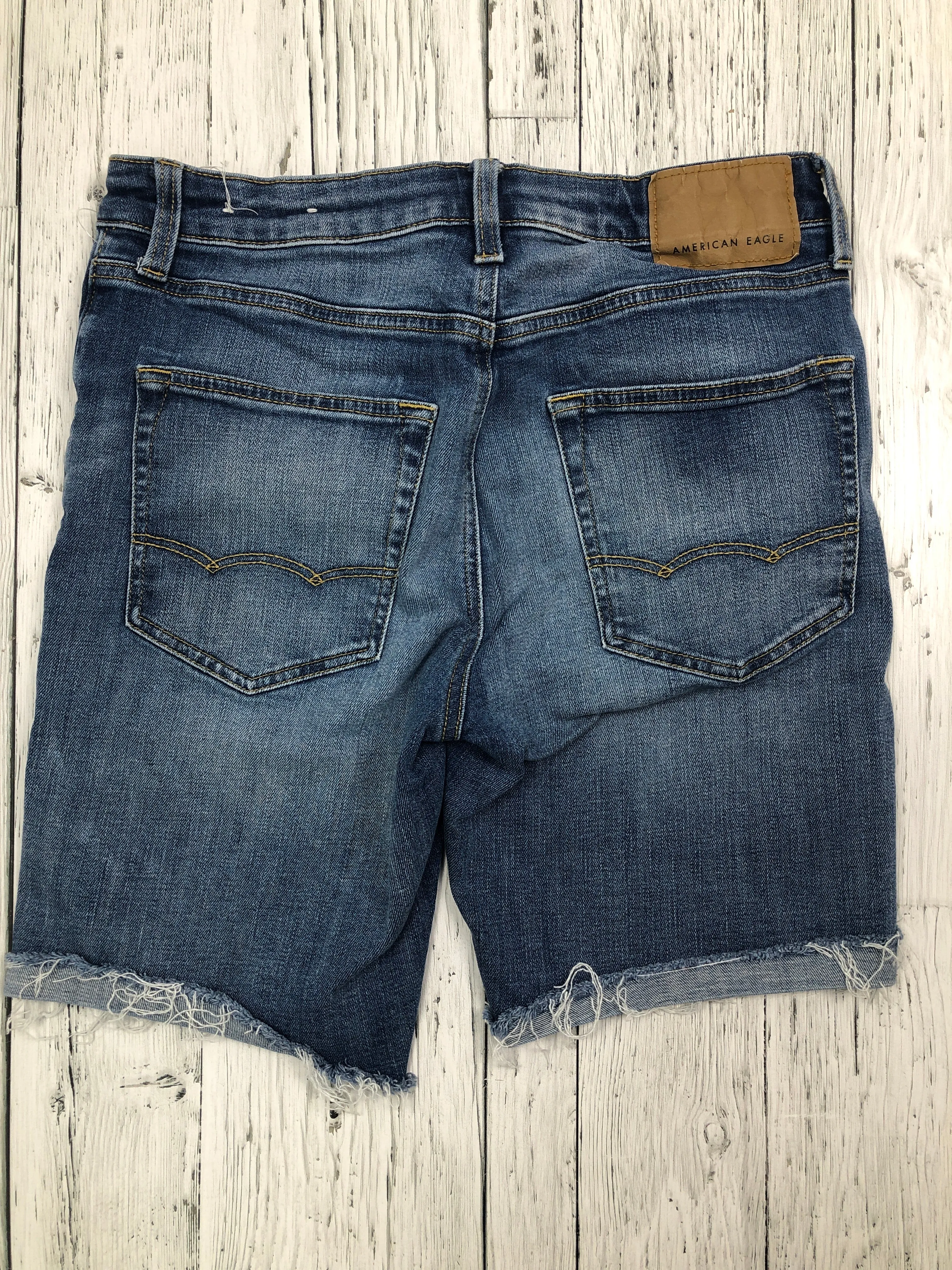 American Eagle blue distressed denim shorts - His S/31