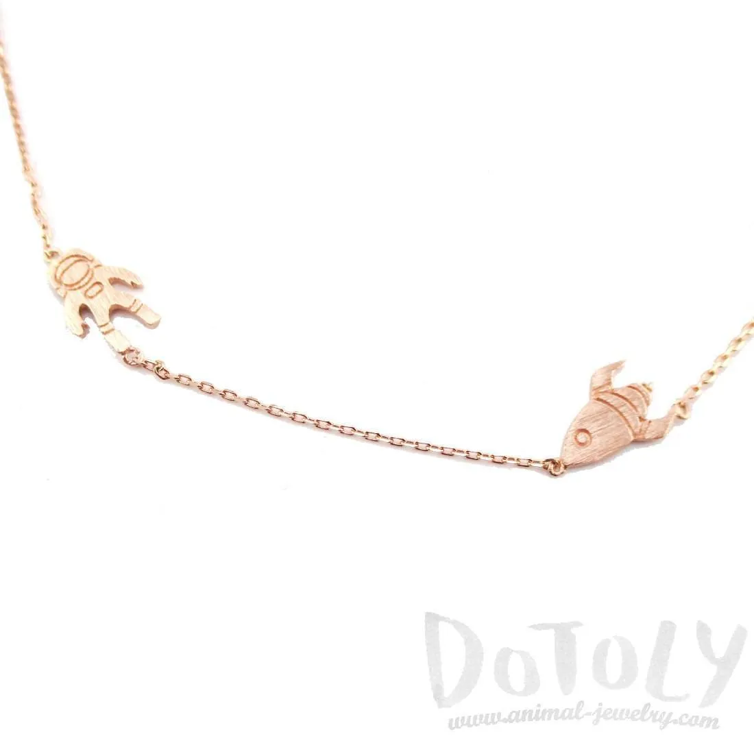 Spaceship and Astronaut Space Travel Themed Charm Necklace in Rose Gold | DOTOLY