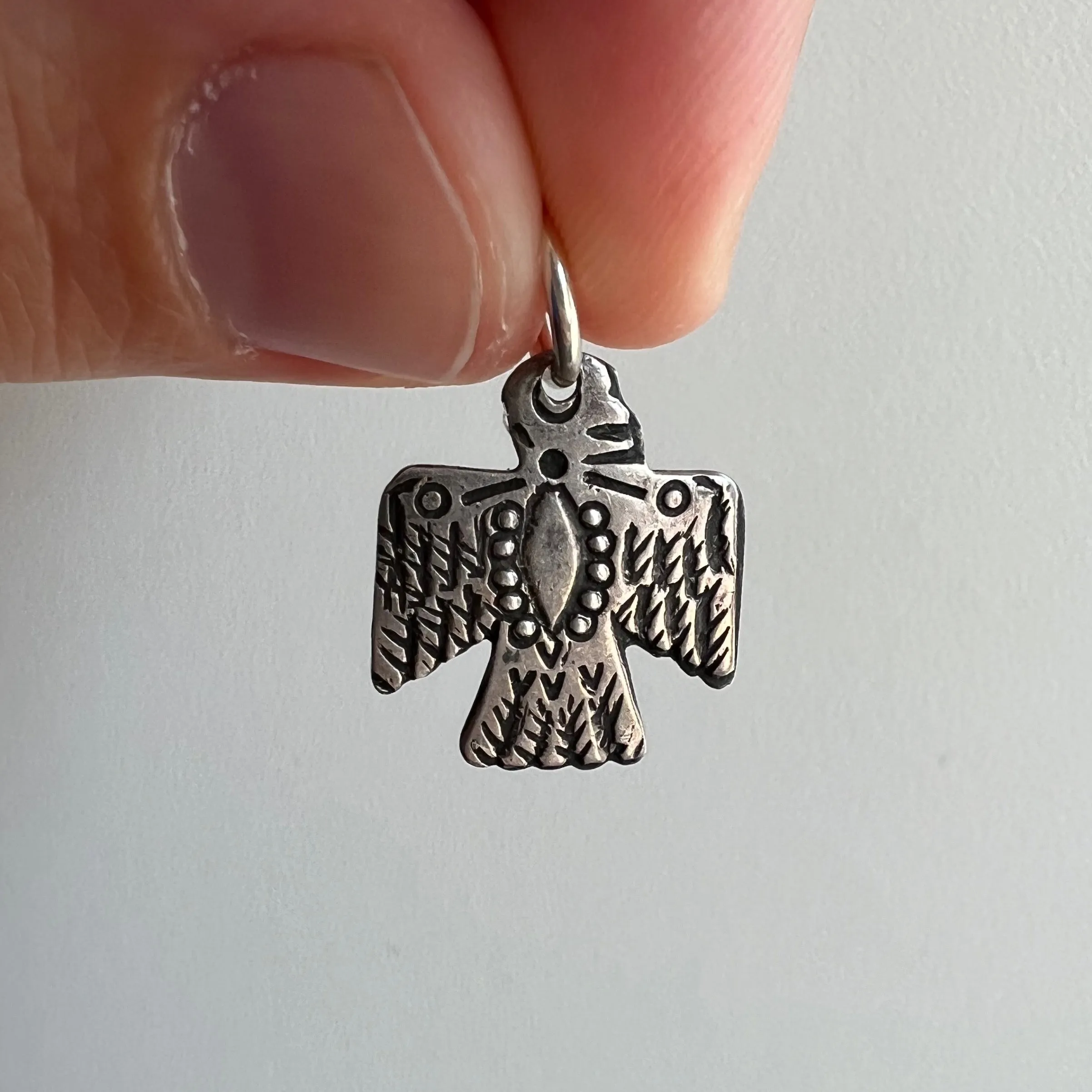 V I N T A G E // diamond chest / sterling silver stamped thunderbird / a charm or pendant