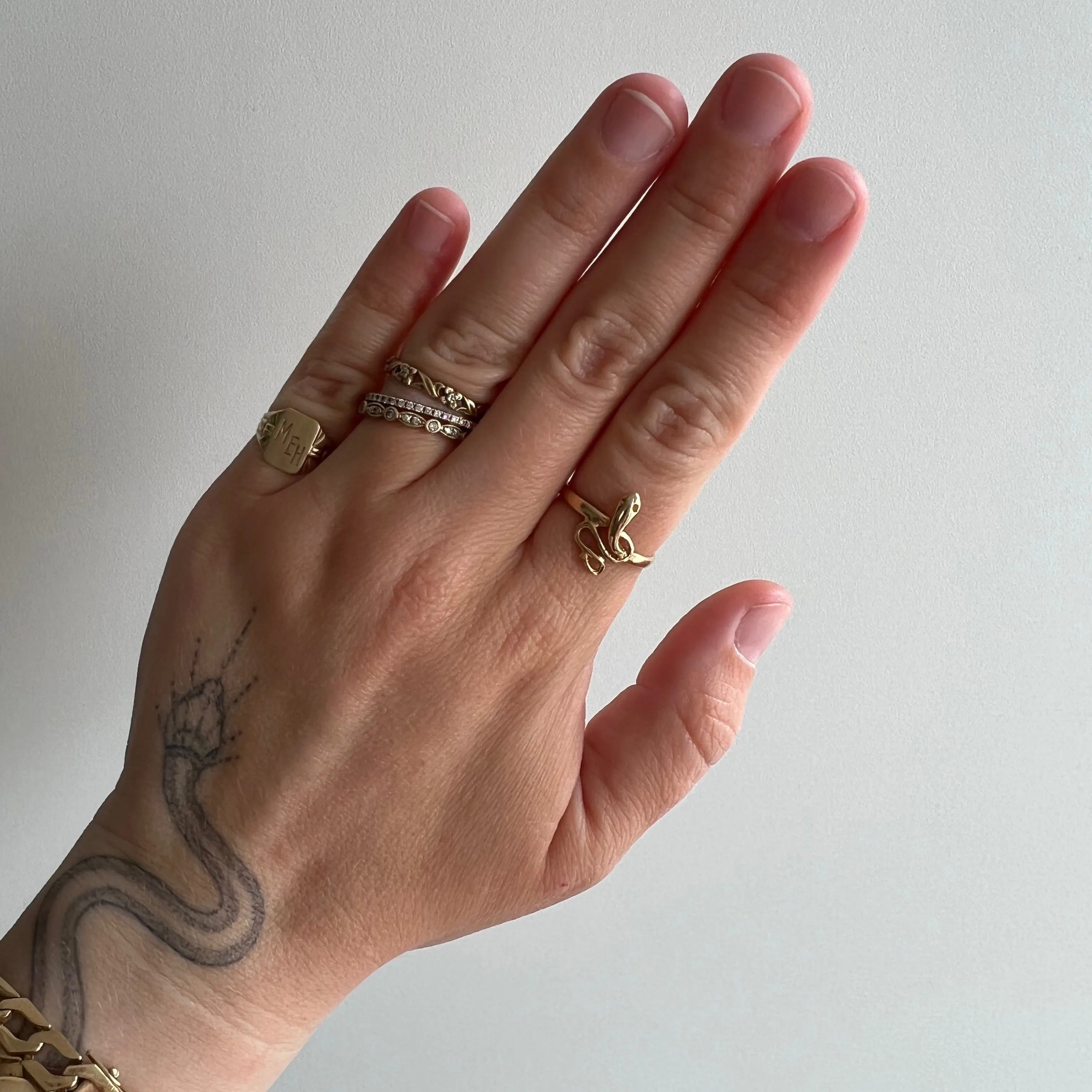 V I N T A G E // knotted embrace / 14k yellow gold snake ring / size 6